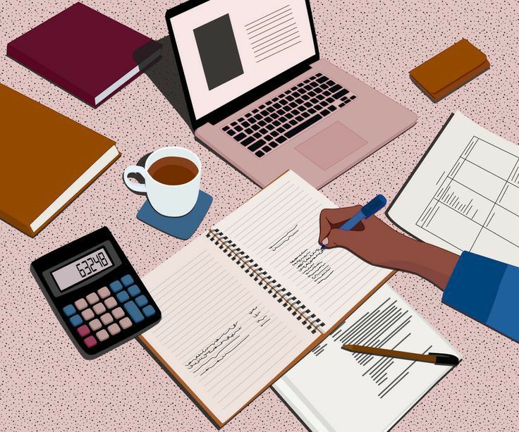 This may contain: a person is writing on a notebook next to a laptop and calculator