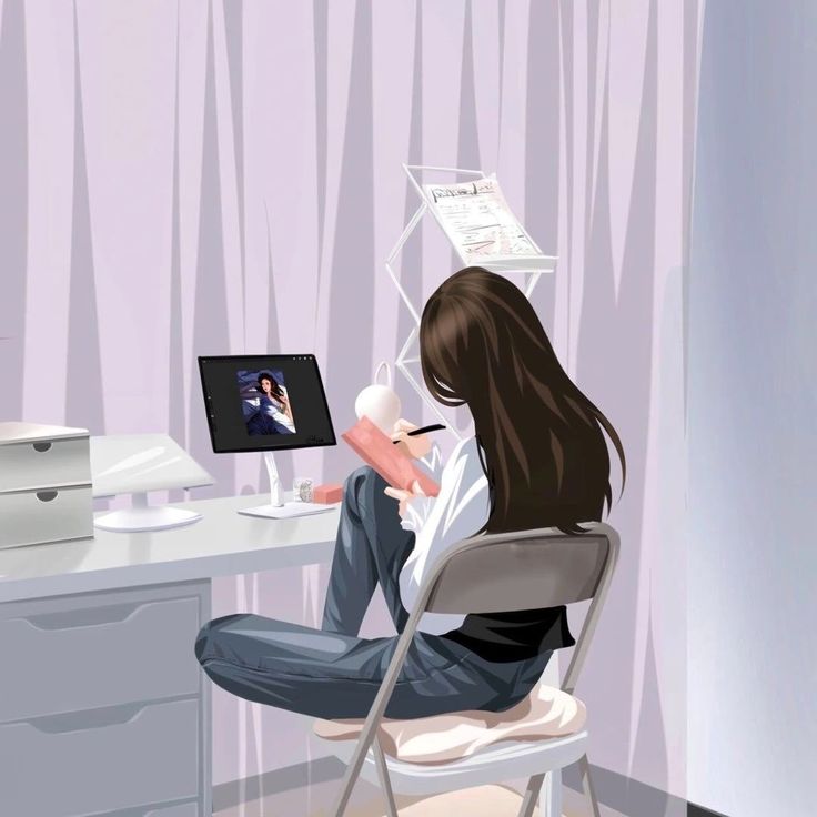This may contain: a woman sitting in a chair at a desk with a computer and printer on it